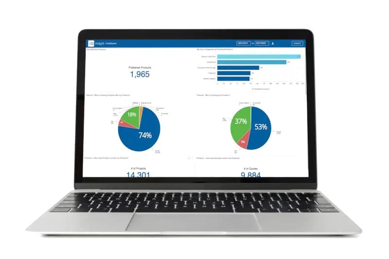 A laptop displaying data analytics dashboards with bar and pie charts, numerical figures, and project statistics on the screen.