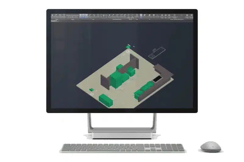 A desktop computer with a keyboard and mouse displays a 3D architectural model in CAD software on the monitor.