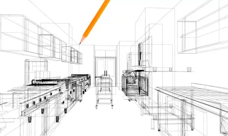 A pencil draws a wireframe sketch of a modern kitchen, showing cabinets, countertops, appliances, and shelving in a linear perspective.